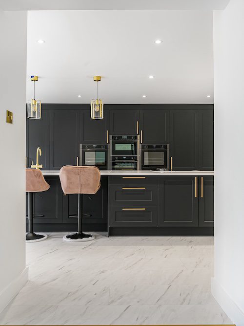 Double-storey house extension  by KT5 Construction.