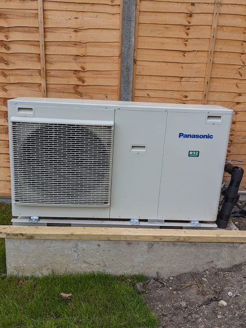 A modern air source heat pump unit.